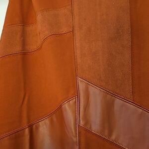Women's sleeveless rust color with faux leather